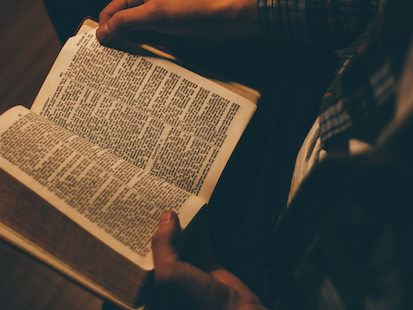 Man reading Bible